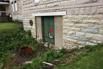 Here is a door way leading ri ght into the basement.  The basement, in any insane asylum was often the scene of rape, beatings, torture and other horrid attrocities, where patients were shackled to the walls for hours on end.