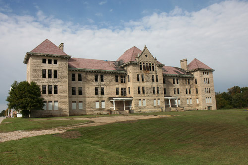 Many who drive by the old Bartonville Insane Asylum claim they can see the ghost of a little girl, staring out the window.  Rumor has it that the girl was comitted at a very young age, and resided there all of her life until her death at 73.